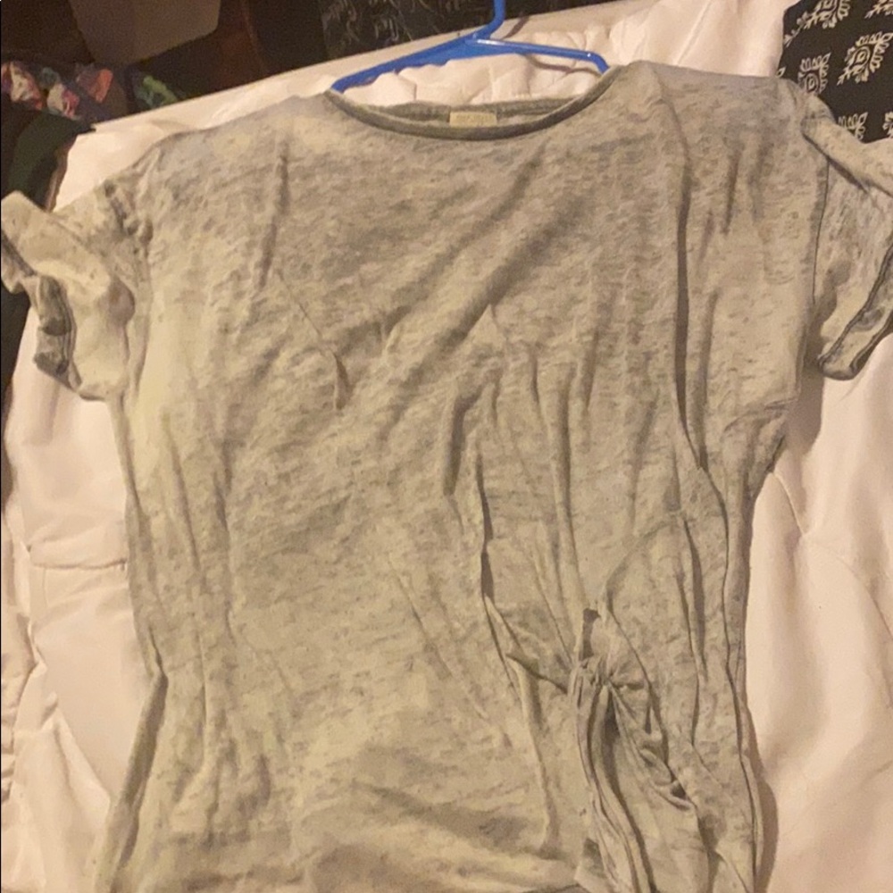 A gray shorts sleeve shirt